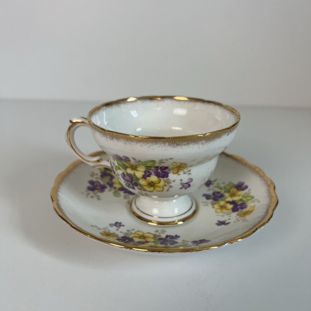 Rosina Bone China Made in England Tea Cup and Saucer Yellow Floral Gold Trim